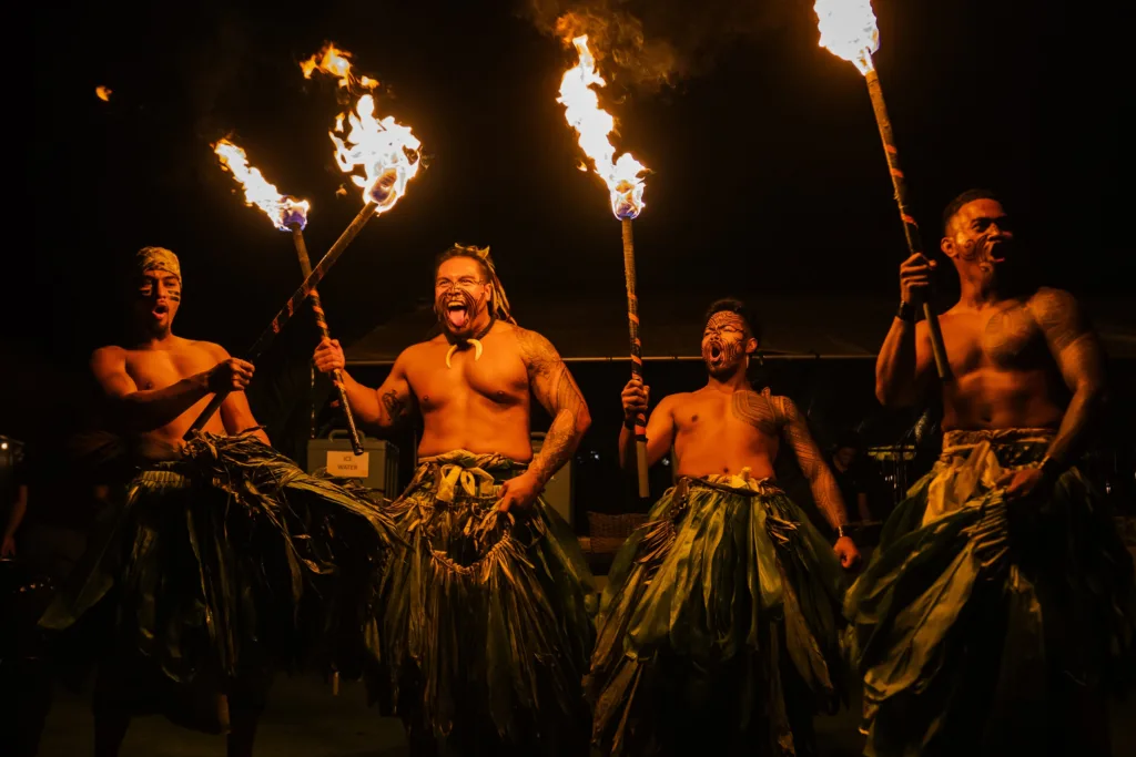 Classic Hawaiian luau with traditional food and dance
