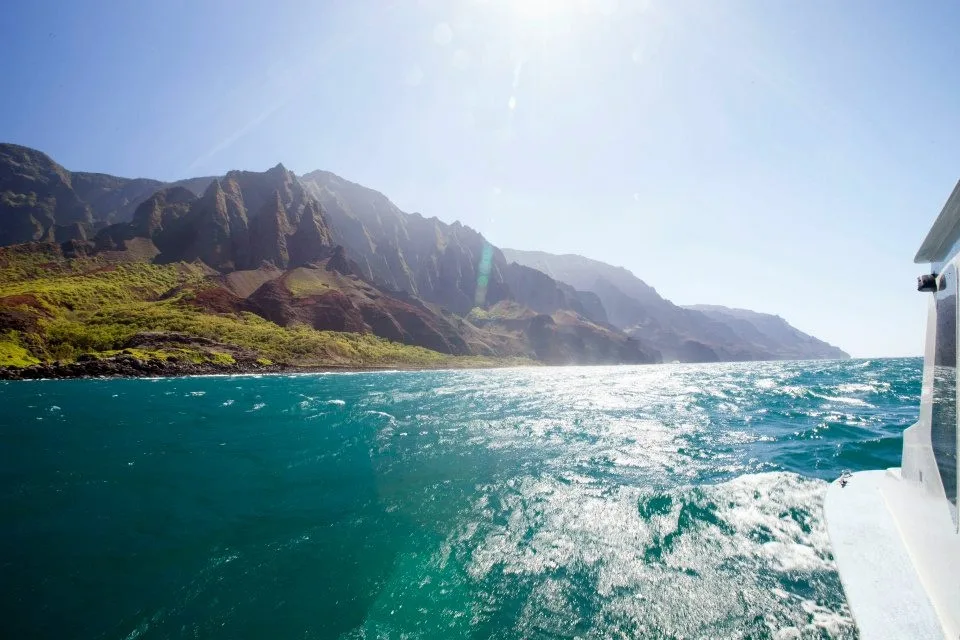 Scenic boat ride along Nā Pali Coast cliffs and sea