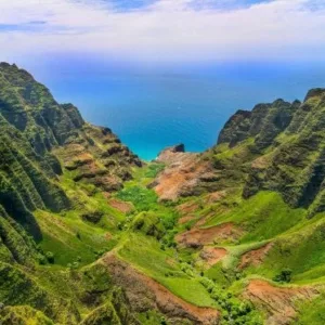 Helicopter flying over Kauai island during exclusive tour