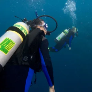 Instructor teaching scuba divers about nitrox use