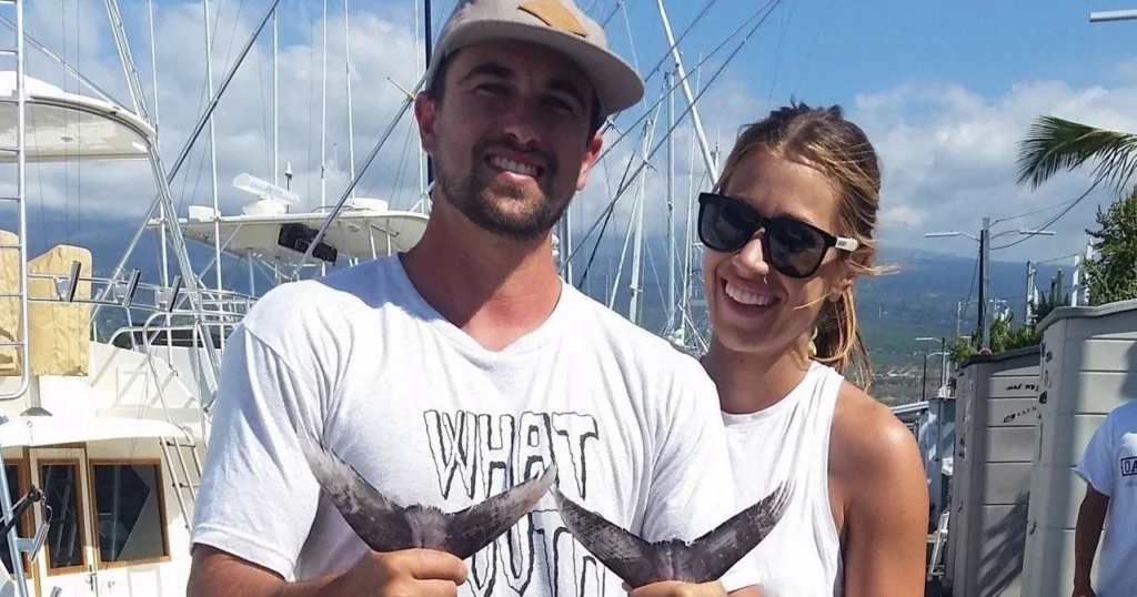Family snorkeling together in clear tropical waters