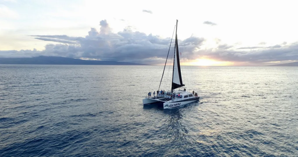 Couple enjoying a romantic sunset sail on Maui waters
