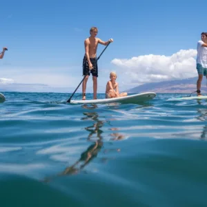 Group stand up paddle tour in Wailea with whale watching