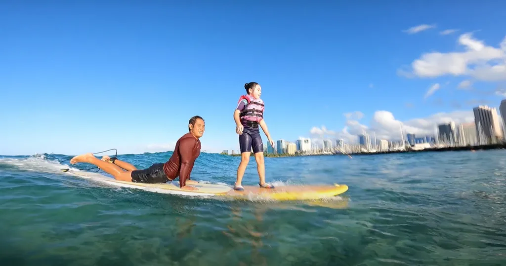 Child receiving a private bike lesson on a sunny island path