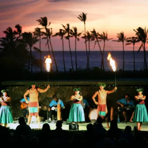 Guests seated enjoying an authentic Hawaiian luau