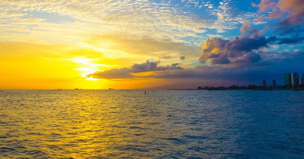 Couple enjoying a private evening cruise at sunset