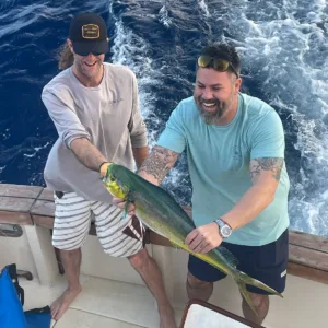 Anglers catching fish on a deep sea boat