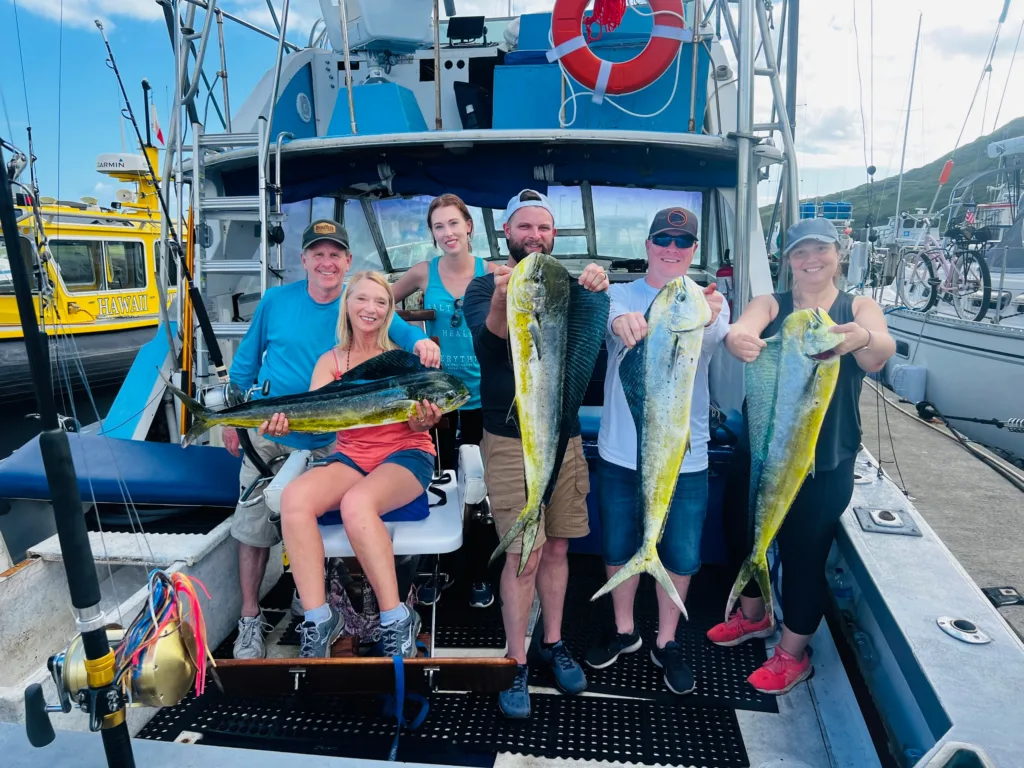 Small group aboard Bertram boat for Kauai island tour