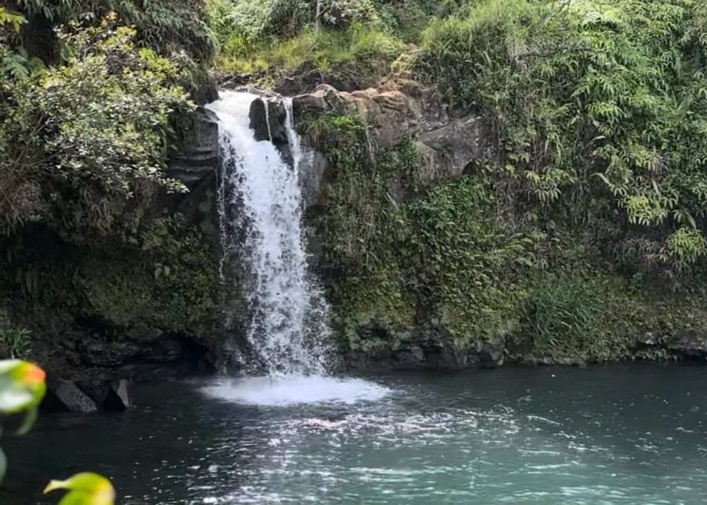 Jeep driving along Hana coast with ocean views