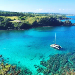 Jeep driving along the west Maui coastline