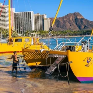 Sailboat cruising near Waikiki and Diamond Head