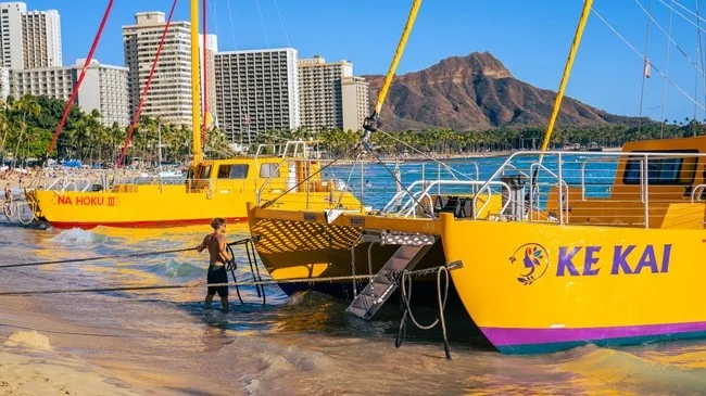 Sailboat cruising near Waikiki and Diamond Head