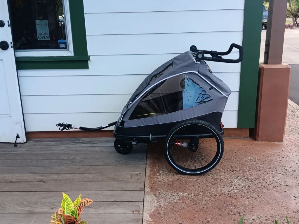 Electric bike trailer carrying supplies on scenic trail