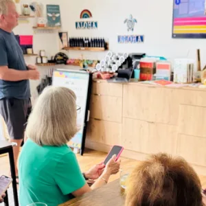 Group tasting fresh honey at a local bee farm
