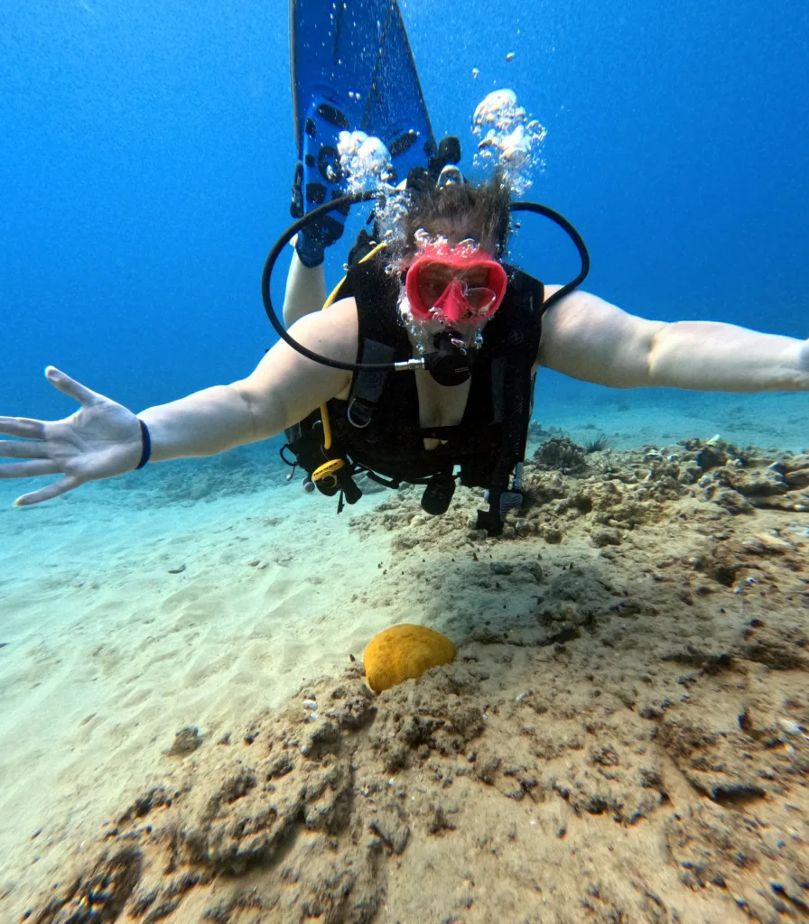 Beginner diver preparing for first underwater adventure