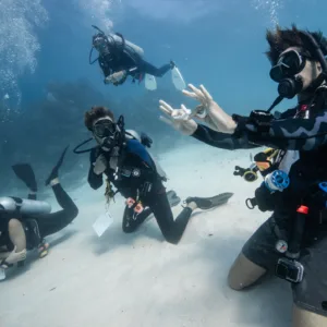 Advanced scuba diver practicing skills with private instructor