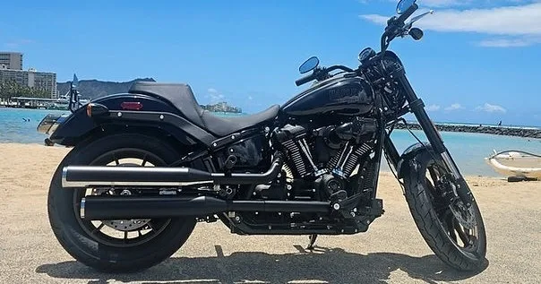 2024 Harley Davidson Low Rider S parked on coastal road