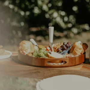 Sunset charcuterie board served on a pristine Maui beach