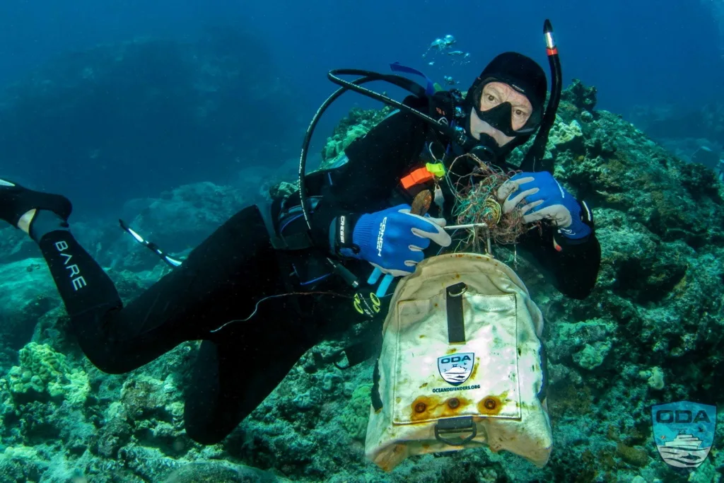 Scuba diver participating in PADI Dive Against Debris event