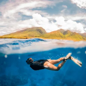 Custom private charter boat sailing near Maui coastline