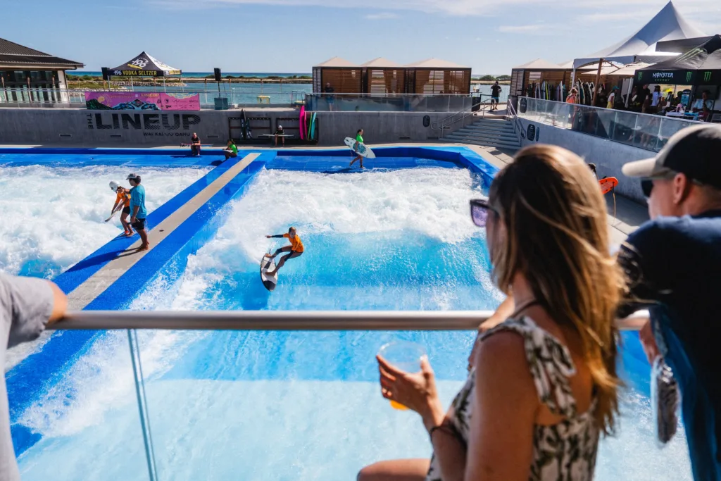 Surfer riding a giant wave near Waikiki shore