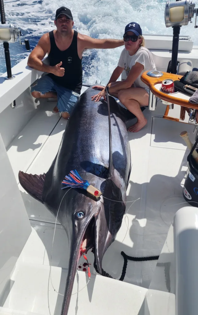 Fishing boat cruising near tropical island shores