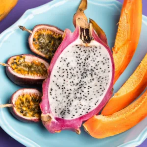 Tasting exotic tropical fruits in a lush setting