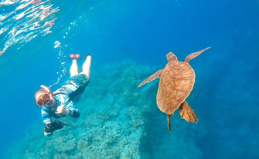 Man riding a guided sea scooter near Kona coast