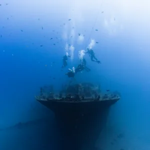 Certified divers preparing for a shipwreck scuba dive