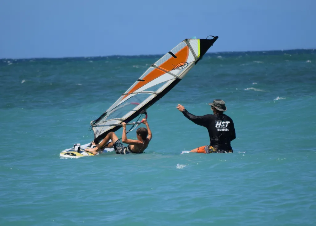 Private windsurfing lesson on clear water