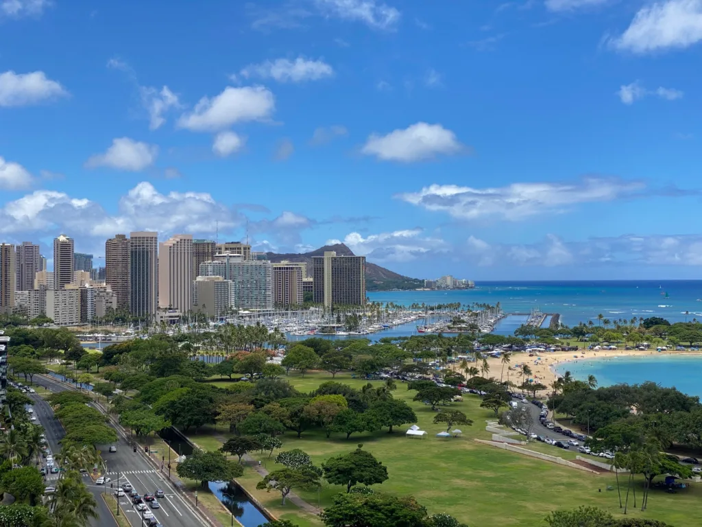 Circle Island Tour boat cruising along ocean coastline