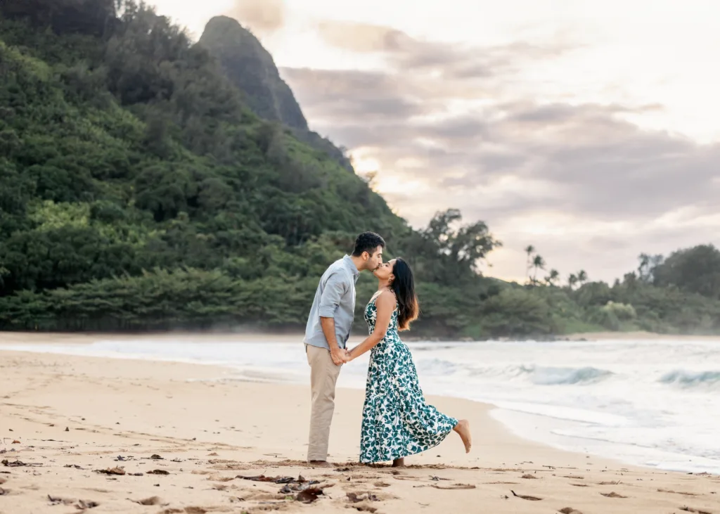 Couple enjoying a 45 minute photo shoot on Kauai shore