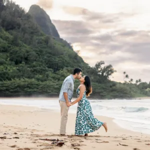 Couple enjoying a 45 minute photo shoot on Kauai shore