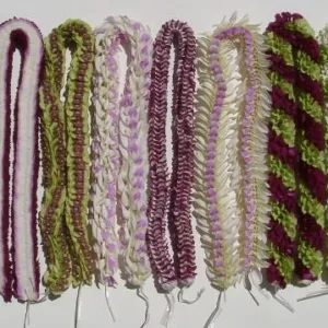 Colorful assortment of nine leis arranged in a gift pack