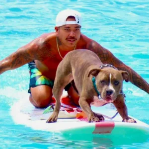 Students learning to surf at King Kamalu Surf School in Waikiki