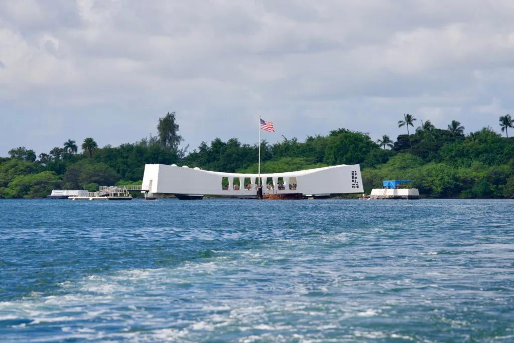 Tour group visiting the Arizona Memorial at Pearl Harbor