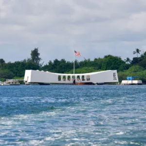 Tour group visiting the Arizona Memorial at Pearl Harbor