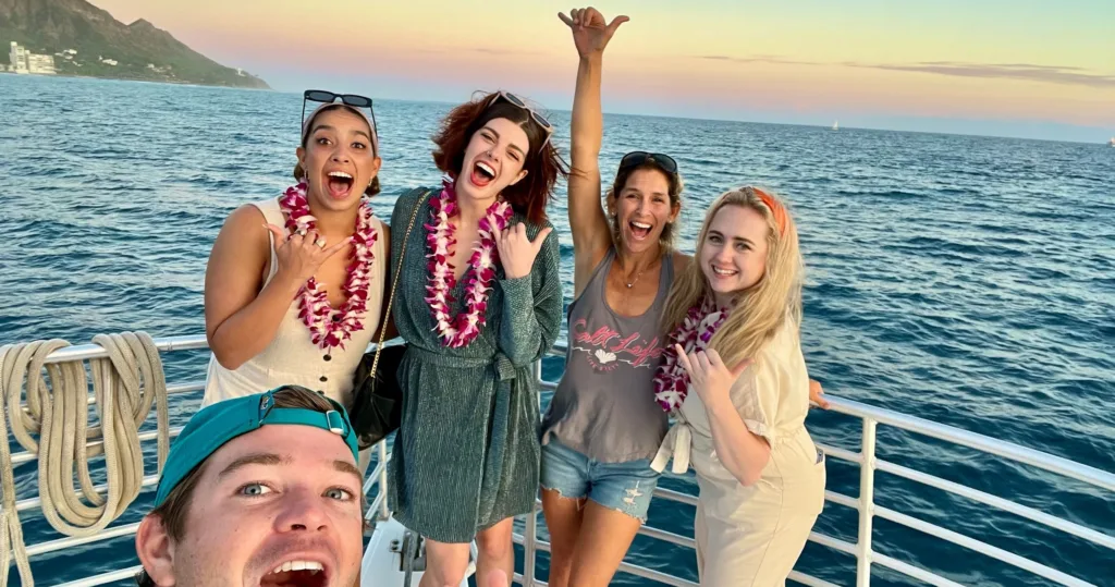 Sunset cruise boat sailing off Waikiki shore