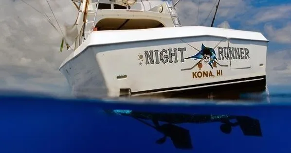 Private charter boat exploring Kona’s snorkeling hotspots