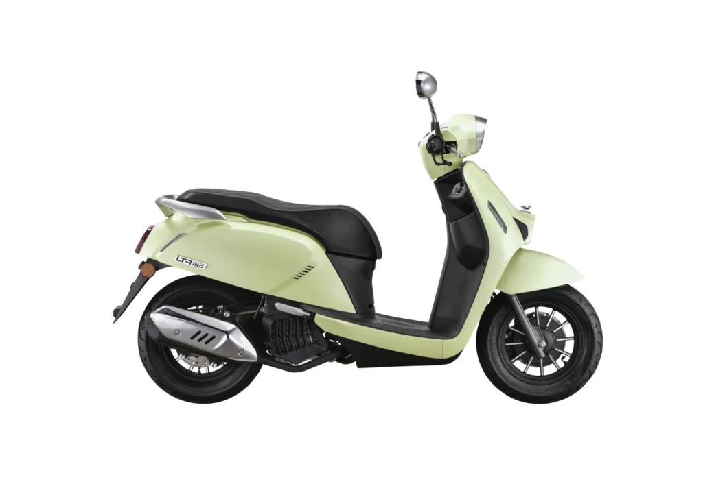 Two-person scooter parked near tropical Maui beach