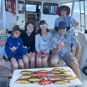 Shared fishing charter boat with anglers casting lines