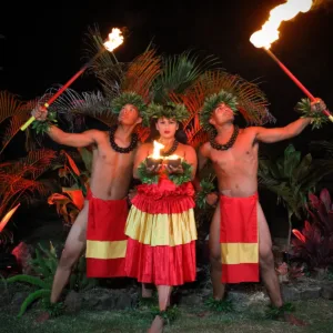 Guests experiencing traditional Hawaiian luau with gold package
