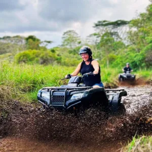 Riders exploring volcanic terrain on Ohana Ranch ATV tour