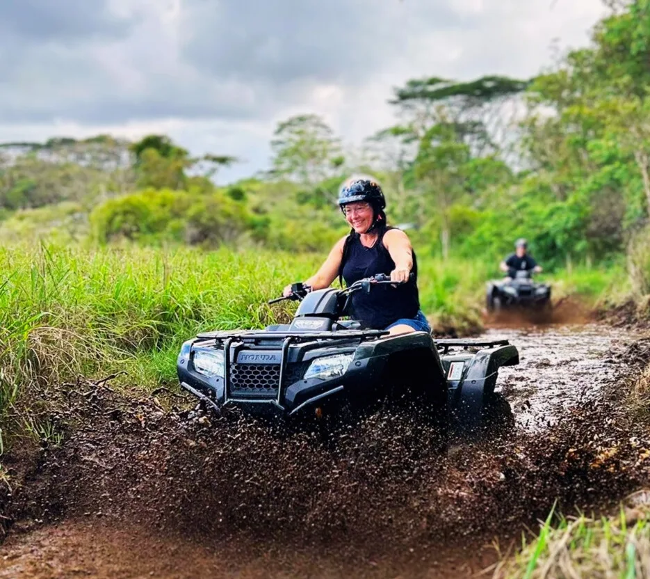Riders exploring volcanic terrain on Ohana Ranch ATV tour