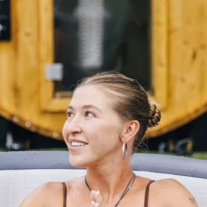 Relaxing inside a luxury mobile sauna on a scenic island