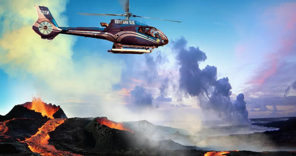 Helicopter tour showcasing waterfalls and volcanic landscapes
