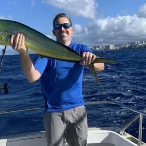 Group of friends fishing on a half-day private sport charter