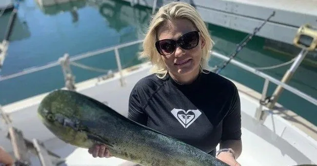 Anglers fishing together on full-day sport fishing charter boat