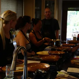 Luxury island tour vehicle driving along coastal road