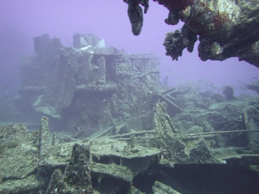 Scuba divers preparing for three tank dive adventure